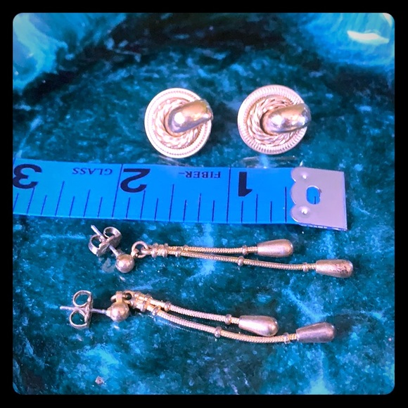 Set of two goldtone earrings.